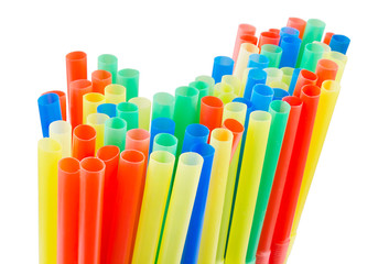 Colorful drinking straws on white background