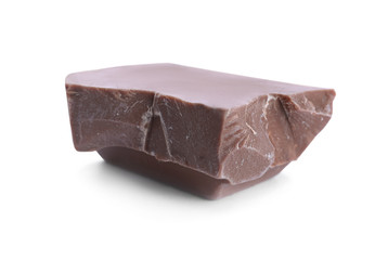 Piece of milk chocolate isolated on white