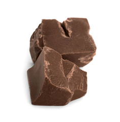 Pieces of milk chocolate isolated on white