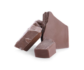 Pieces of milk chocolate isolated on white
