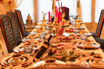 A beautiful table setting for Thanksgiving dinner in a restaurant. Private dining. Horizontal image, indoors, selective focus.