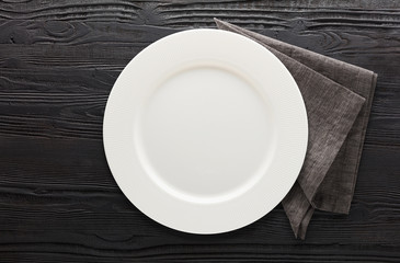 empty plate on wooden background