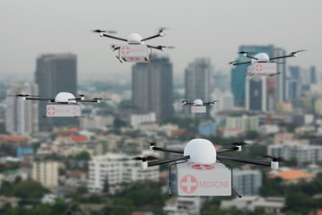 A group of drones transporting with a first aid box flying. With the city as a background.
Emergency medical care concept. 3D Rendering.