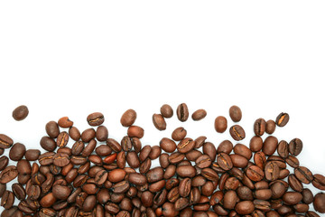 Many brown roasted coffee beans background