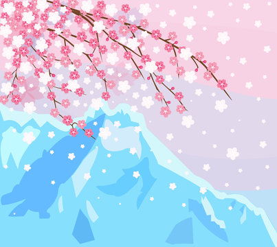 The pink sakura blossoms. Branches of a blossoming cherry. In the background of the mountains.