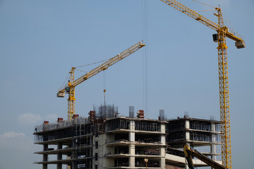 Fototapeta na wymiar building construction site with blue sky background