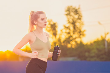 Young woman Jogging in the Park