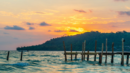 Sok San Beach, Koh Rong, Cambodia- Feb, 2020 : a wooden pier and a beautiful sunset from the Sok San Beach, Koh Rong, Cambodia