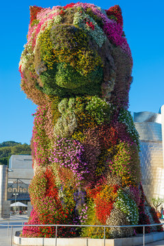 Jeff Koons Puppy, a West Highland White Terrier in a variety of flowers, in the Basque city Bilbao and in front of the Guggenheim Museum. The city is famous for her contemporary art
