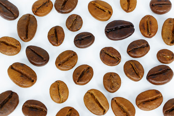 Coffee beans pattern, spread on isolated white background