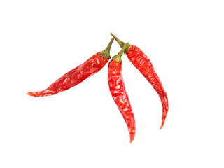 Three red chili pepper pods isolated on white