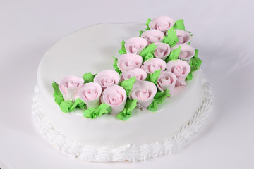 Cake with cream flowers