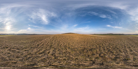 Fototapeta na wymiar full seamless spherical hdri panorama 360 degrees angle view on among fields in spring evening with awesome clouds in equirectangular projection, ready for VR AR virtual reality content
