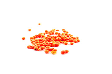 Orange lentils that are quick to cook on a white background. the lists are often used in Indian cuisine.