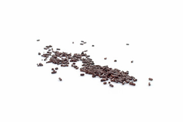 A pile of chocolate sprinkles in random order isolated against a white background.