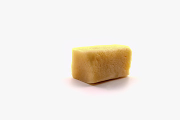 Raw Marzipan block isolated on white background