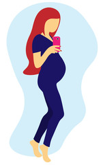 Obraz na płótnie Canvas pregnant girl photographed on the phone