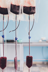 a blood bag for infusion into a clinic. donor blood is administered.