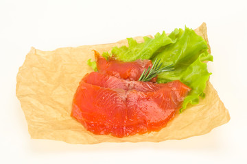 Sliced salmon fillet served rosemary