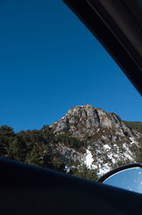 car driving on a mountain road