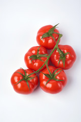 Tomato isolate. Tomato on a white background. Tomatoes top view, side View. With the path cut off.