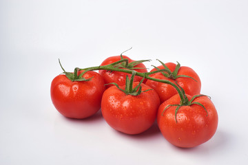 Tomato isolate. Tomato on a white background. Tomatoes top view, side View. With the path cut off.