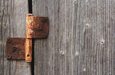 old wooden door with rusty metal
