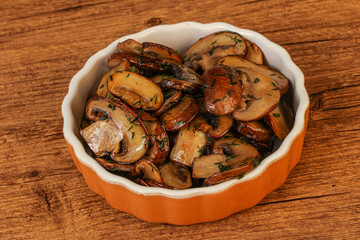 Roasted champignon with herbs and spices