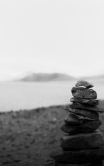 stack of stones near a lake