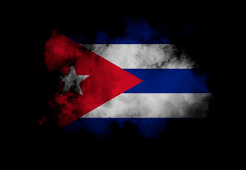 Cuba flag performed from color smoke on the black background. Abstract symbol.