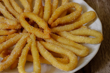 Christmas zeppole or Scauratielli: Water, sugar and flour give life to one of the oldest and most delicious desserts crunchy on the outside, soft on the inside. Campania, in particular in the Cilento