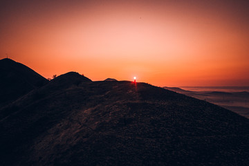 Obraz premium Rana is a significant three-peak mountain 457m. in the western part of Ceske stredohori. The Rana National Nature Reserve is situated on the south-western hill of the trike, is the center of paraglide