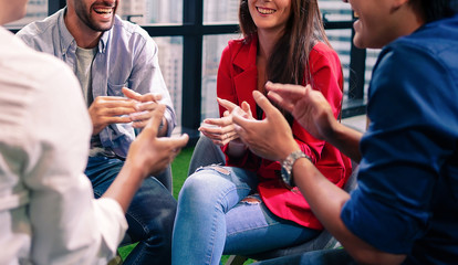 Obraz premium Group of successful young business colleague hand clapping in the office after business work done, achievement and success. teamwork and encouragement concept. 