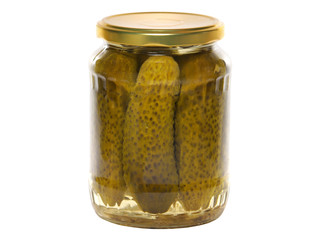 Pickles in a glass jar isolated on a white