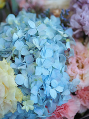 Flower bouquet of fresh hydrangea (Hortensia), roses, chrysanthemum, eustoma, carnations