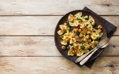 Italian pasta with fried onions, mushrooms and spinach