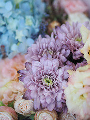 Flower bouquet of fresh hydrangea (Hortensia), roses, chrysanthemum, eustoma, carnations