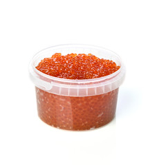 Plastic container with red salmon or keta fish caviar on white background. Sea food