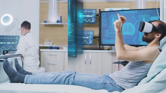 Patient with VR headset on looking at scan results in holographic representation