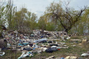 Spring landscape.Ecology of Ukraine. Nature near Ukrainian capital. Environmental contamination. Illegal junk dump.  Kiev,Ukraine