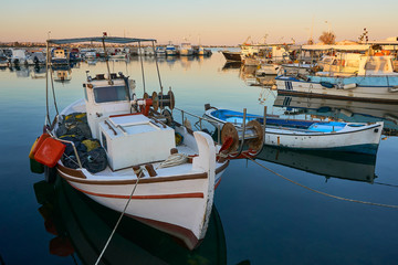 Fototapeta premium Life is tranquil in this small harbor in the nearby of Athens