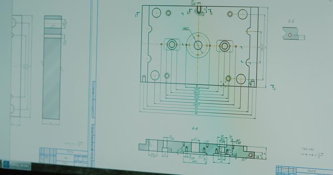 3D rendering representing an plastic injection mold development with the help of the 3d software and computer, middle plan. filmed on camera RED CINEMA