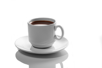 small white porcelain Cup with hot coffee on a white saucer side view isolated on a white background