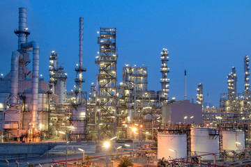 Fototapeta premium Oil and Gas Industrial zone,The equipment of oil refining,Close-up of industrial pipelines of an oil-refinery plant,Detail of oil pipeline with valves in large oil refinery.
