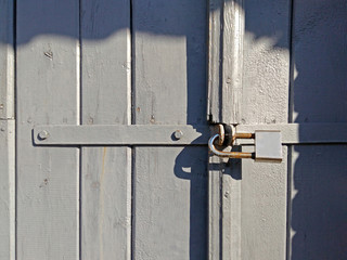 locked wooden door and lock