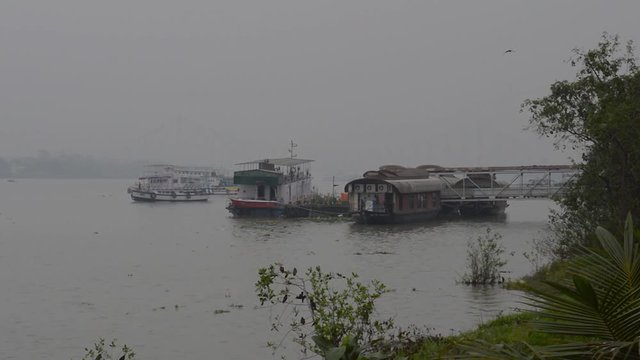 Fairlie Place Ghat Ferry service transportation Terminal Bridge, a quick way to travel for commuters from River Hooghly River bank that connects Kolkata and Howrah city. India South Asia Pacific