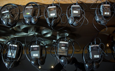 A set of headphones for simultaneous translation during negotiations in foreign languages....