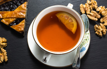 Drinking tea with nut pie