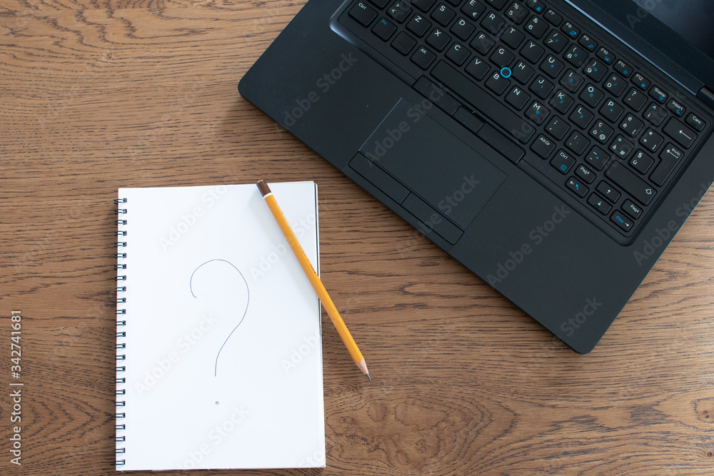 Aufkleber smart working problem concept. laptop, pencil and notebook with question mark on wooden table. worki