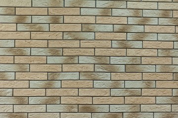 
beige brick wall